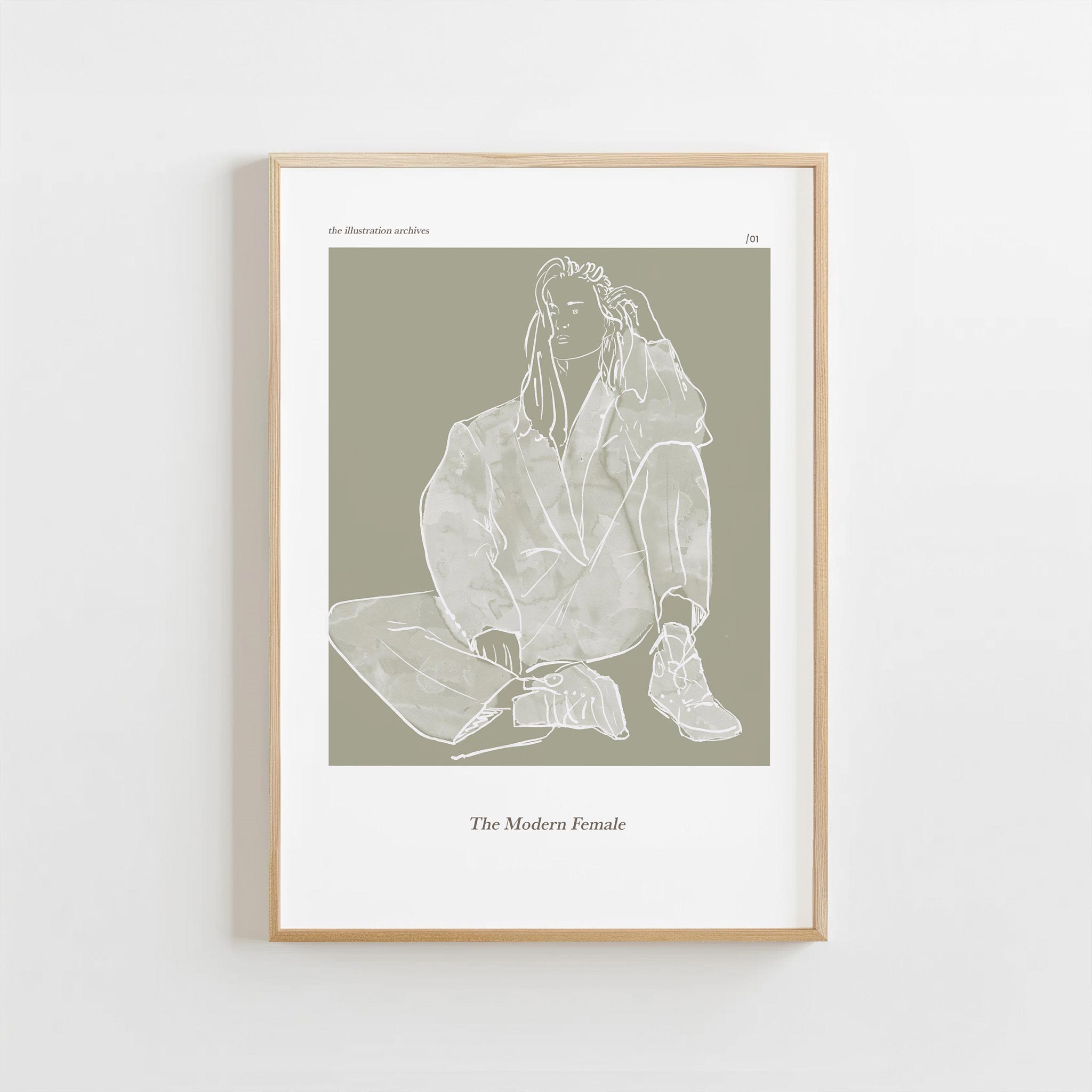 Framed artwork of a line drawing of a woman on a beige background