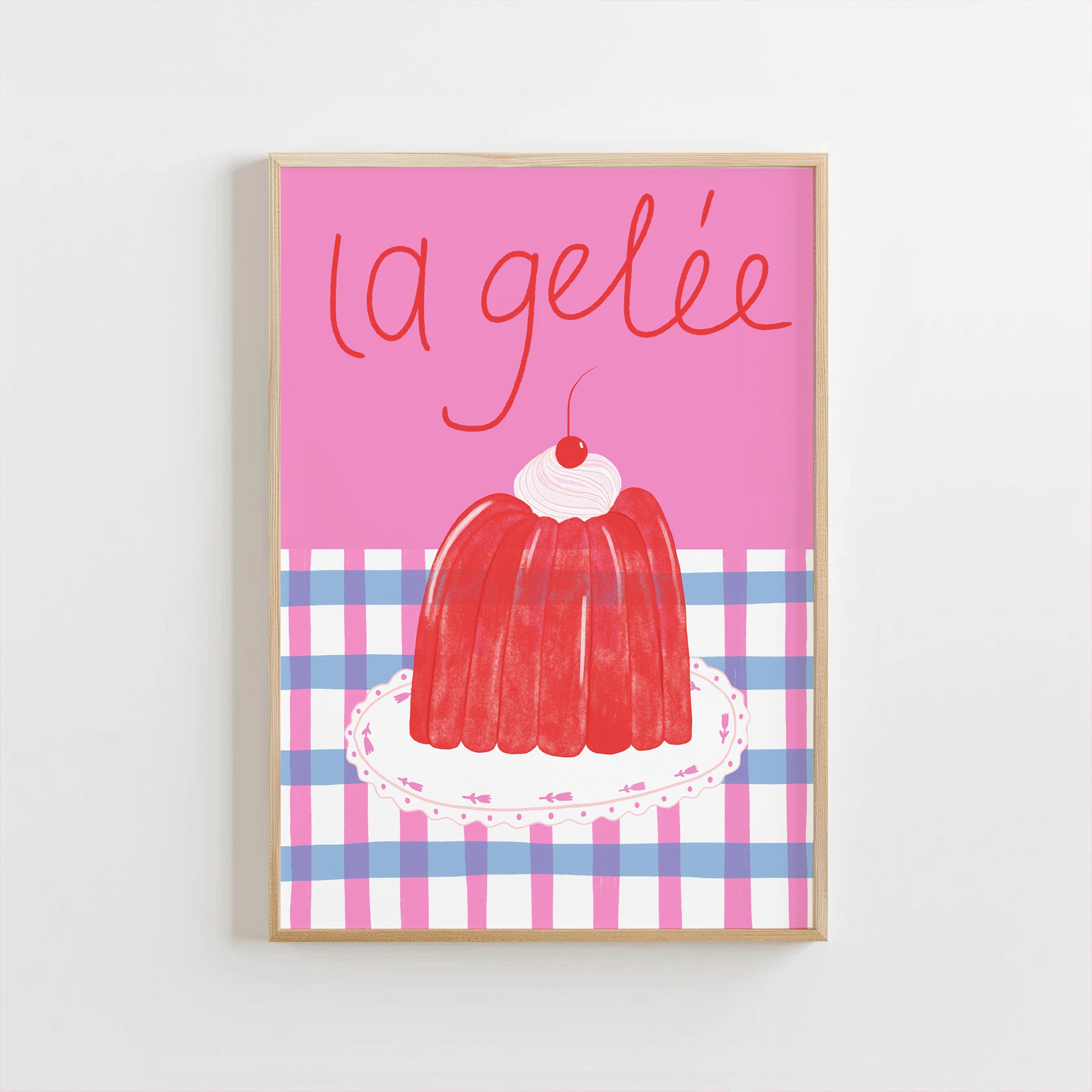 Framed artwork of a red jelly dessert on a pink background with 'La gelée' text.