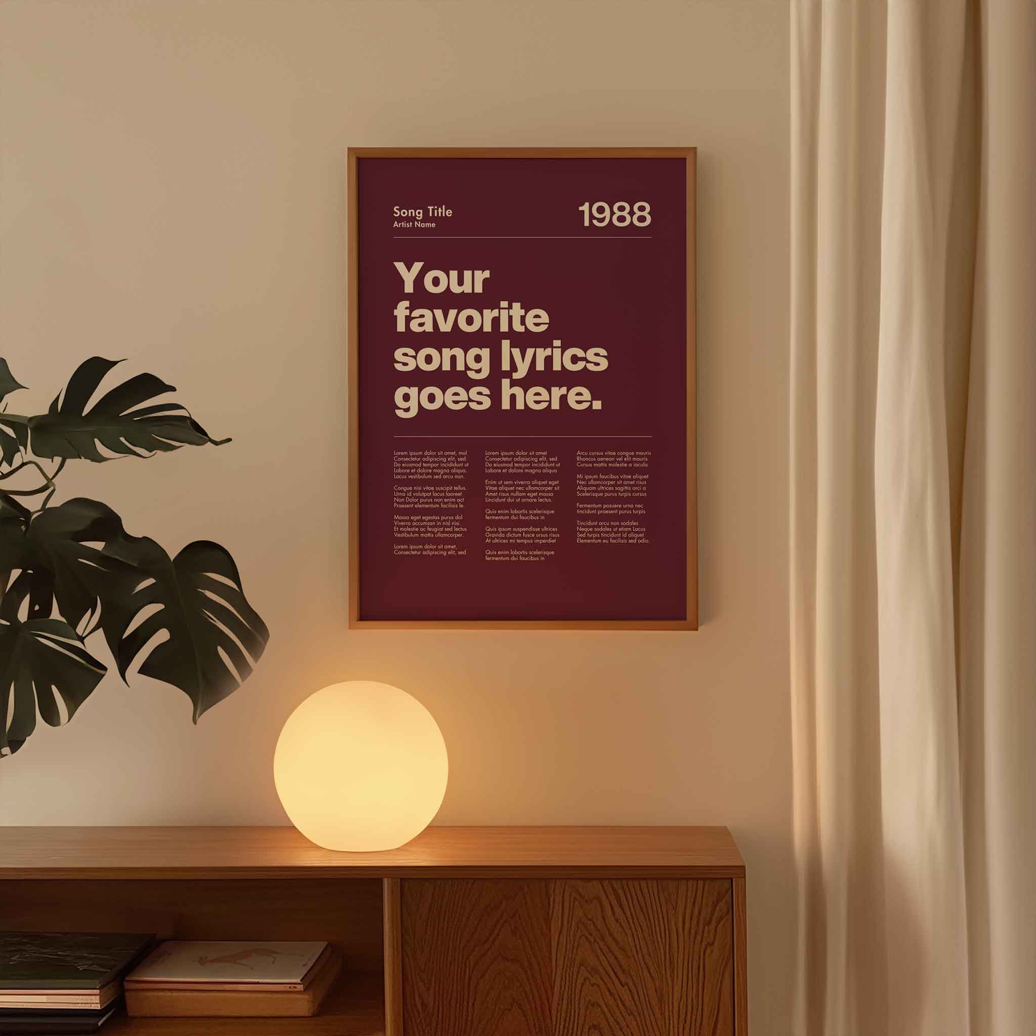 a poster hanging on a wall next to a plant